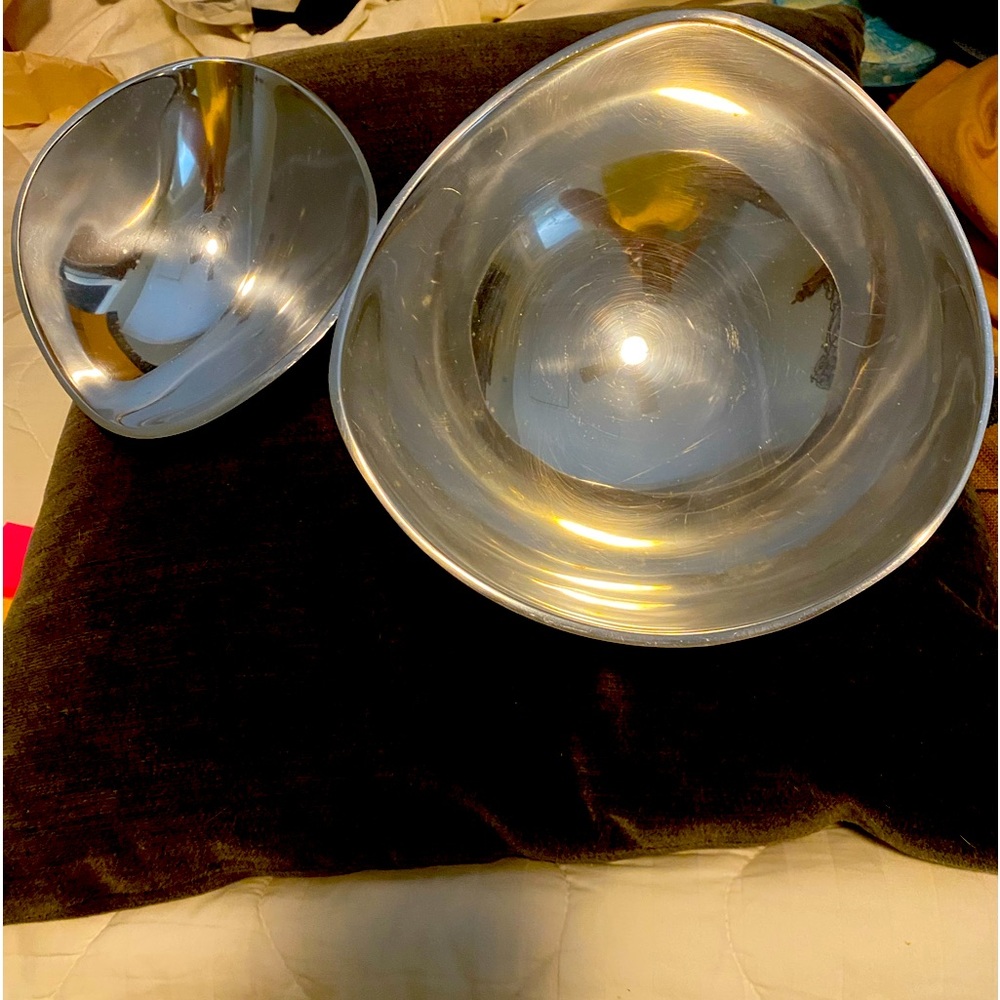 Nambe Alloy, oven safe, nesting bowls (2) does not tarnish.